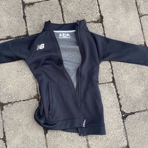 Black woman's activewear sweater